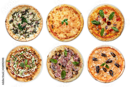 Variety of pizza on plate, white background