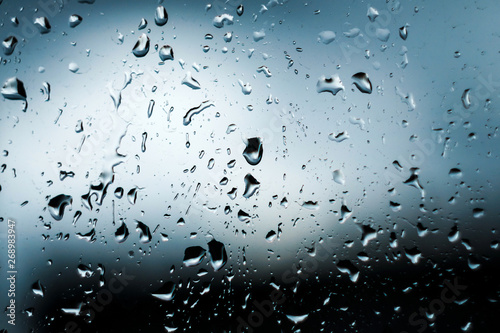 rain drops on the window with blurred background