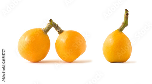 Set of whole loquat or medlar yellow fruits isolated on white background
