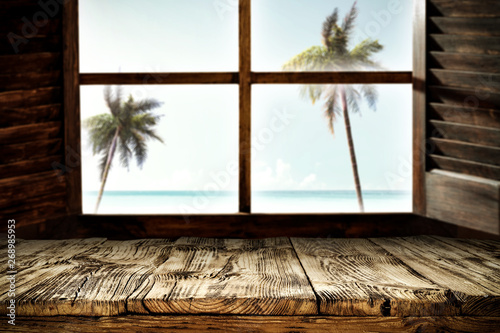 Wooden table background and window space 