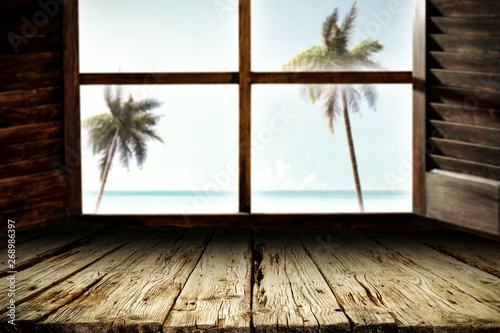 Wooden table background and window space 