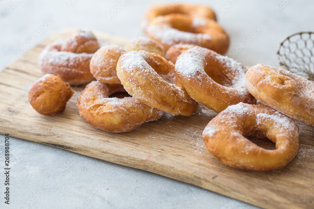 Glazed caramel doughnuts. A close up of fresh glazed doughnuts in a studio setting. donut Glazed caramel doughnuts. A close up of fresh glazed doughnuts in a studio setting. donut