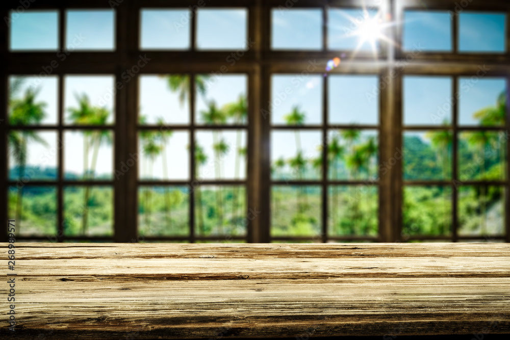 Fototapeta premium Wooden table background and window space 