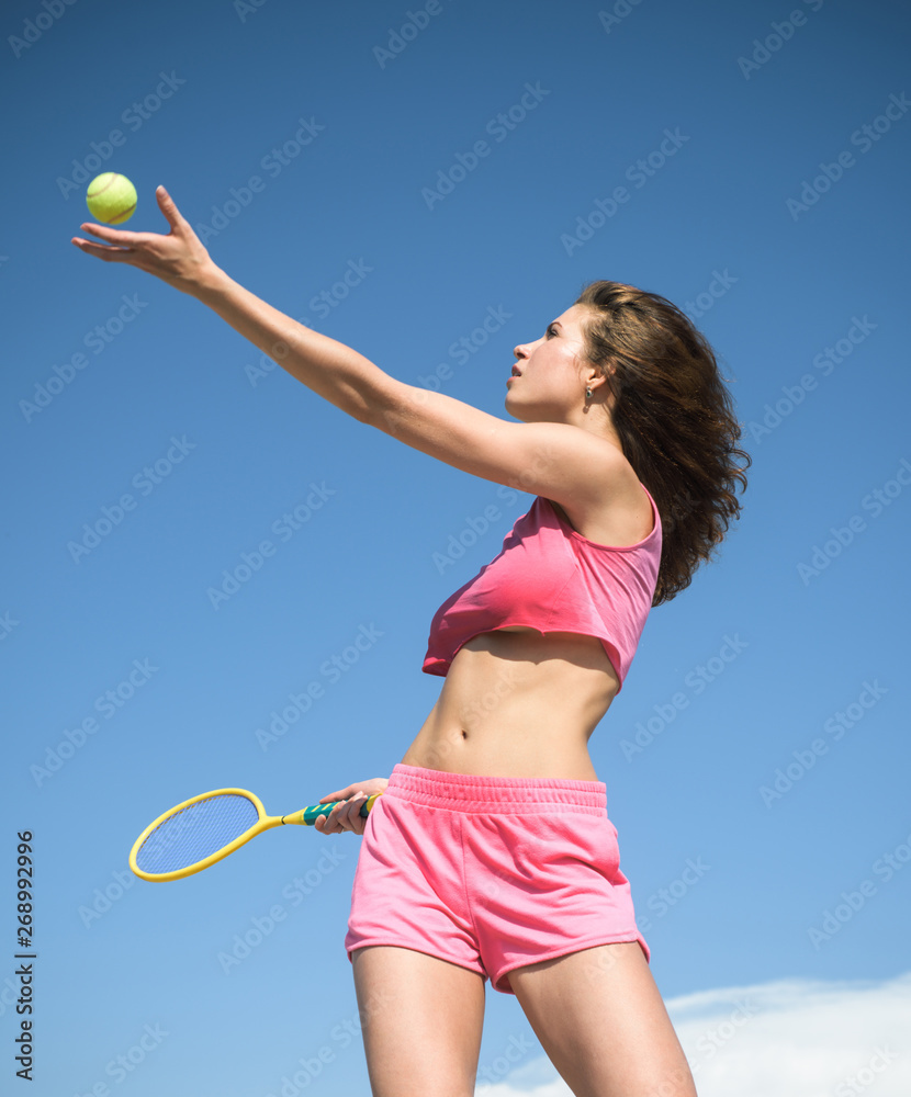 slim girl with fit belly. healthy lifestyle. dieting. freedom. playing big  tennis. sport and fitness. sporty woman training outdoor. perfect body  summer activity. tennis racket and ball. success Stock Photo | Adobe