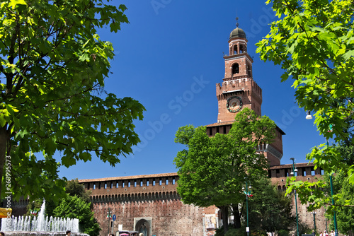 Sforza Castle in Milan. Tower with clock. The tower that overlooks the entrance to the walls of the castle of Milano.