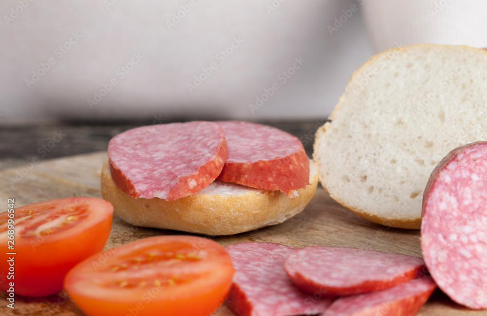 sliced sausage and tomatoes sliced sausage and tomatoes