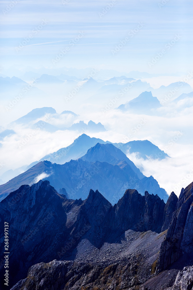 Obraz premium View from Säntis into the surrounding mountain landscape