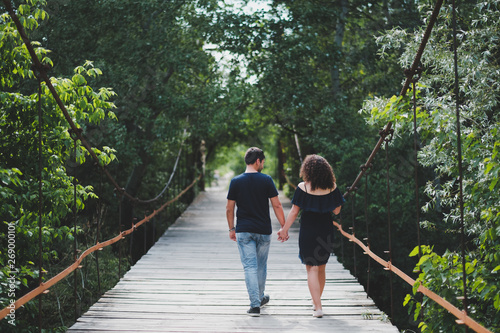 young couple walking in the park