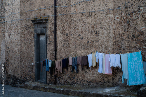 things are dried on a rope near the house