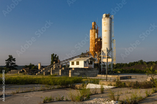 Leftovers of an abandoned concrete plant in a rural area