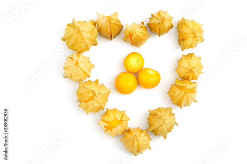 Top view Cape gooseberry articulate in the heart shaped isolated on white background