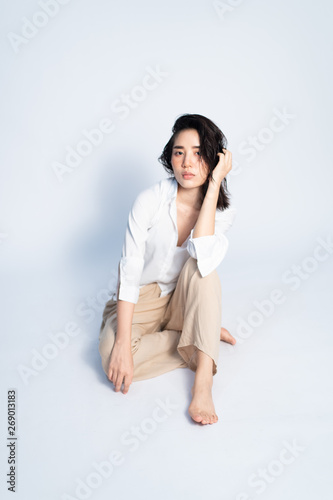 Portrait young Asian girl on white background.