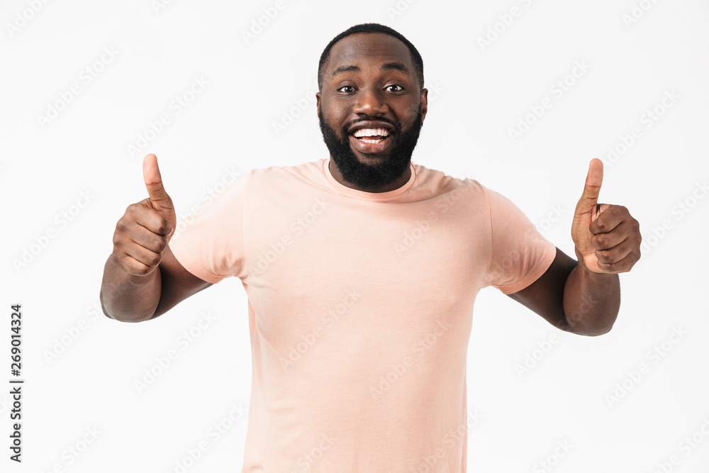 Portrait of a happy excited african man wearing t-shirt Portrait of a happy excited african man wearing t-shirt
