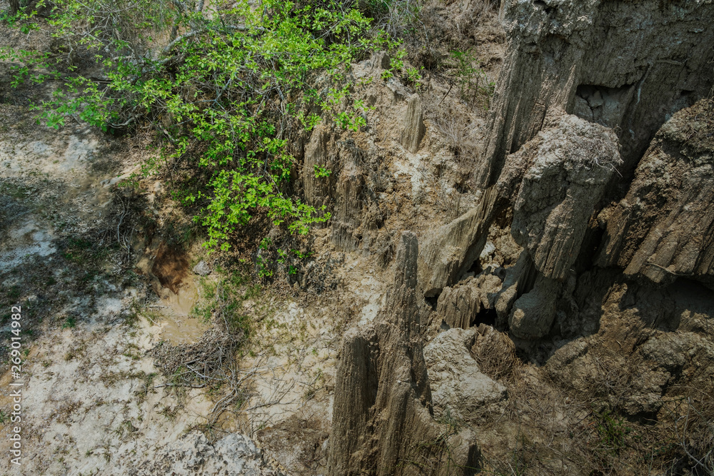 Beautiful Scenery of Water flows through the ground have erosion and collapse of the soil  into a  natural layer at Pong Yub,  Ratchaburi,Thailand.