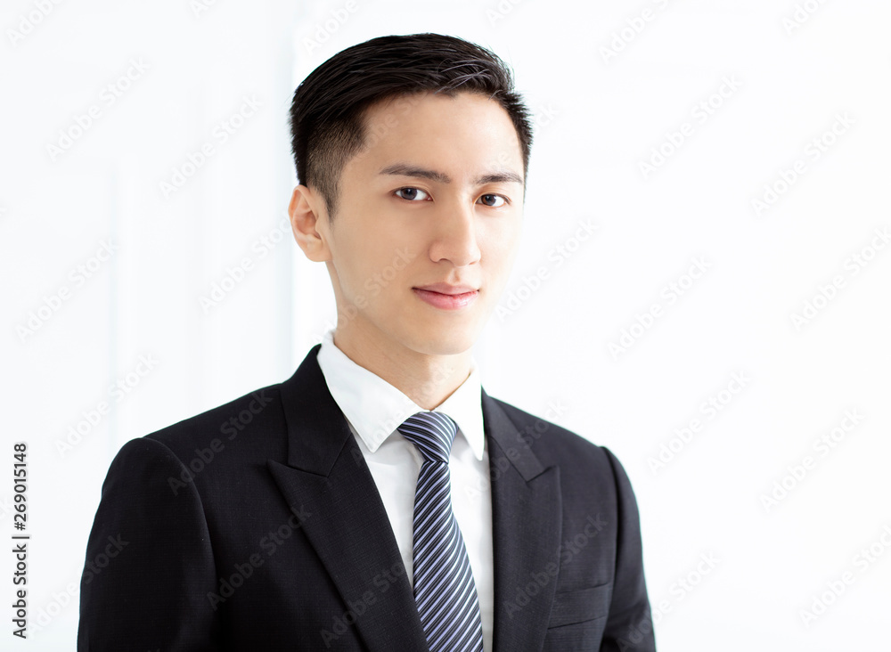 Portrait of smiling young business man Portrait of smiling young business man