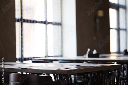 Vintage room cafe or restaurant. Tables opposite the window.