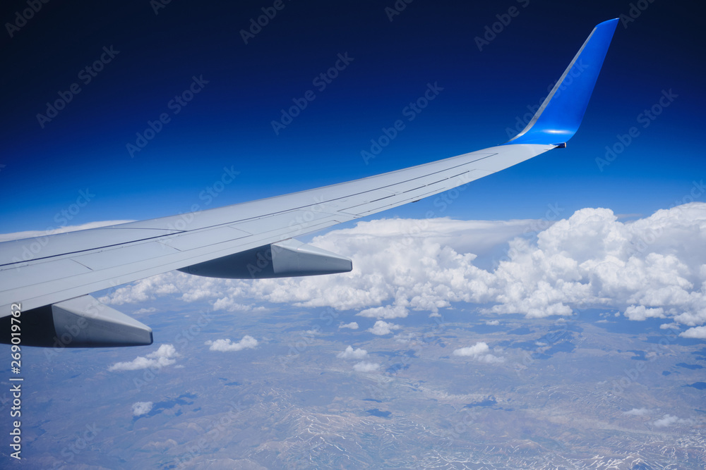 Plane horizon aerial view. Airplane wing sky view Plane horizon aerial view. Airplane wing sky view