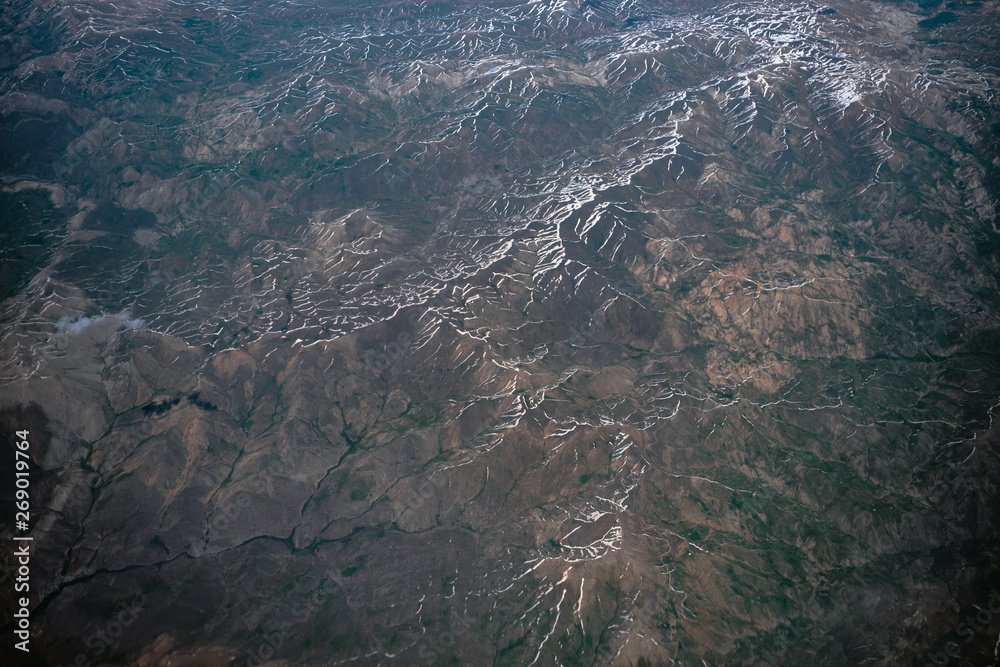 Aerial mountains map view. Airplane view middle east landscape