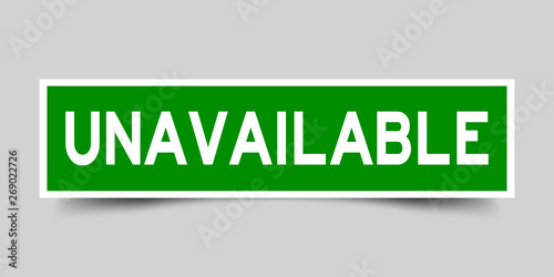 Square green sticker label in word unavailable on gray background