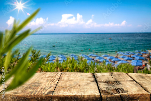 Desk of free space and summer beach background  © magdal3na