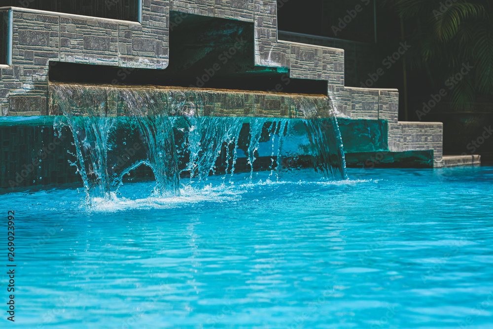 Water flows into the pool in the sport club.