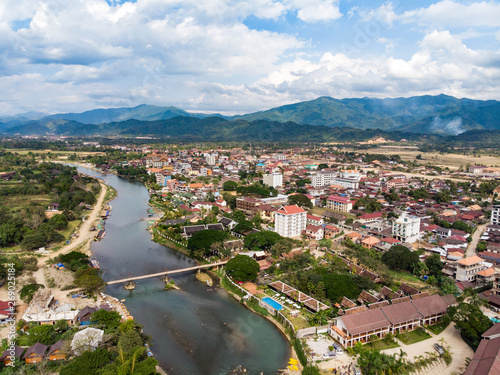 big bamboo bridge over river in Vang Vieng. Laos. Southeast Asia. Nam Song River top view, aerial view photo