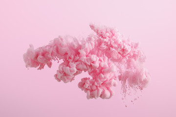 pink paint splash in water isolated on pink