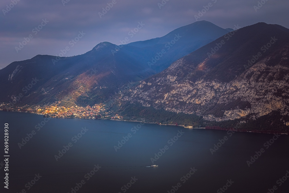 Lake panorama from `Monte Isola`. Italian landscape. Island on lake. View from the island Monte Isola on Lake Iseo, Italy. Holiday, lombardy.