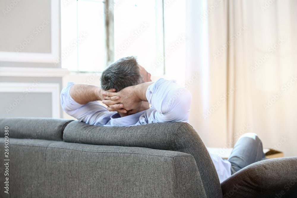 Handsome mature man resting at home Handsome mature man resting at home