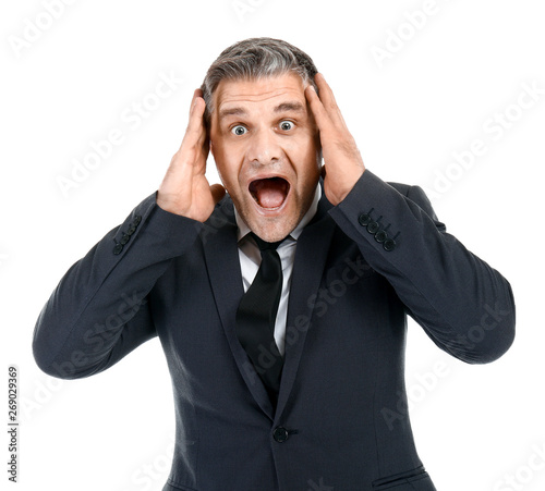 Screaming mature businessma...