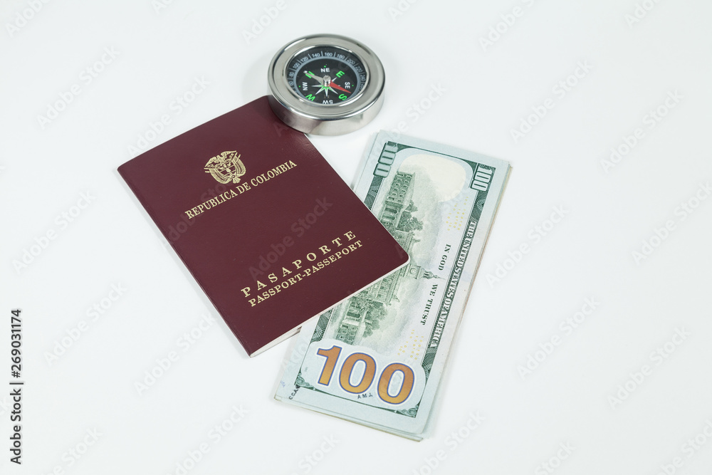 travel concept, Colombian passport with dollar bills for travel abroad travel concept, Colombian passport with dollar bills for travel abroad