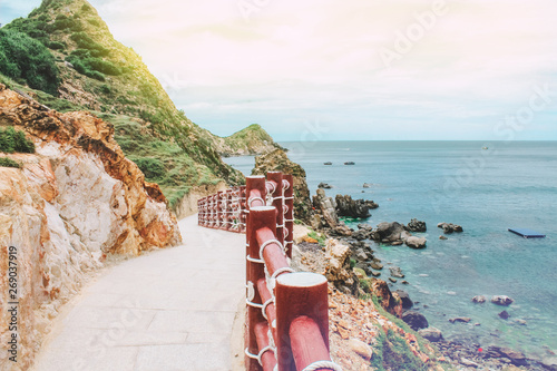 Walkway path along rocky beach in Eo Gio (Wind Strait), Quy Nhon, Vietnam.