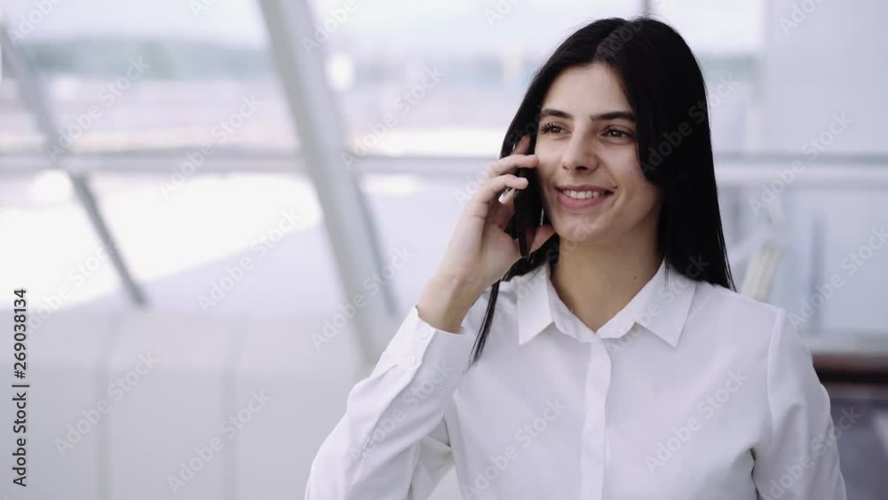 business lady is having break and she has phone call
