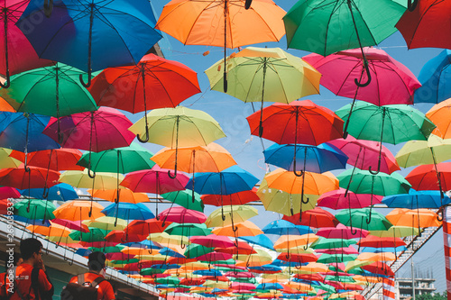 Colored umbrellas hanging in festival days in Ho Chi Minh city  Vietnam