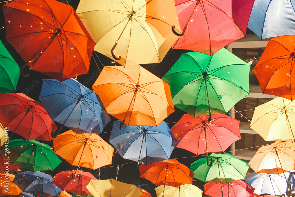 Colored umbrellas hanging in festival days in Ho Chi Minh city, Vietnam Colored umbrellas hanging in festival days in Ho Chi Minh city, Vietnam