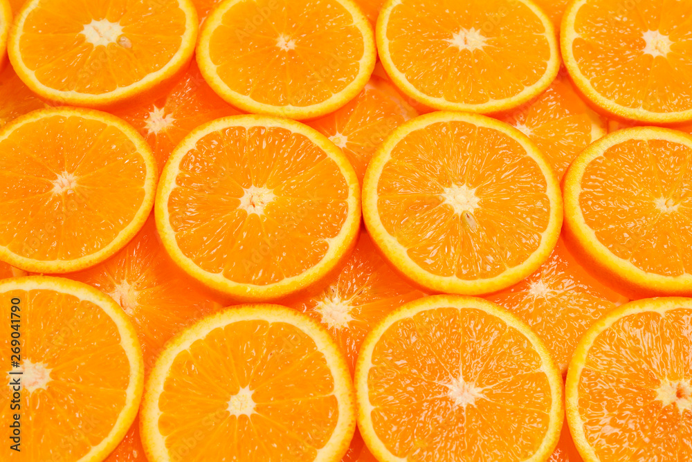Slices of oranges as a background, top view. Slices of oranges as a background, top view.