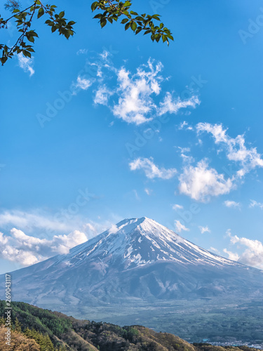 Close up top of beautiful Fuji mountain with snow cover on the top with clouds, Japan