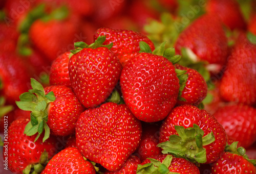 Close up heap of fresh strawberry on retail display
