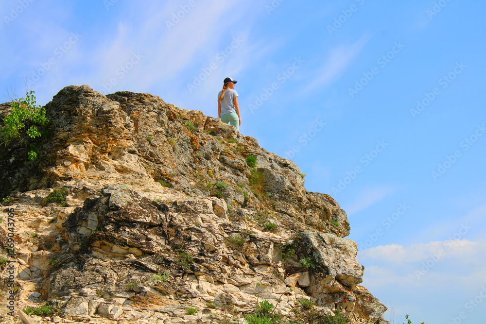 rock climber on top of mountain