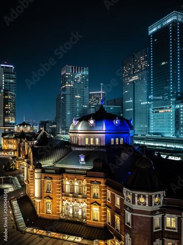 Asia business concept for real estate and corporate construction - panoramic urban city skyline aerial view with neon lights at night in Tokyo, Japan