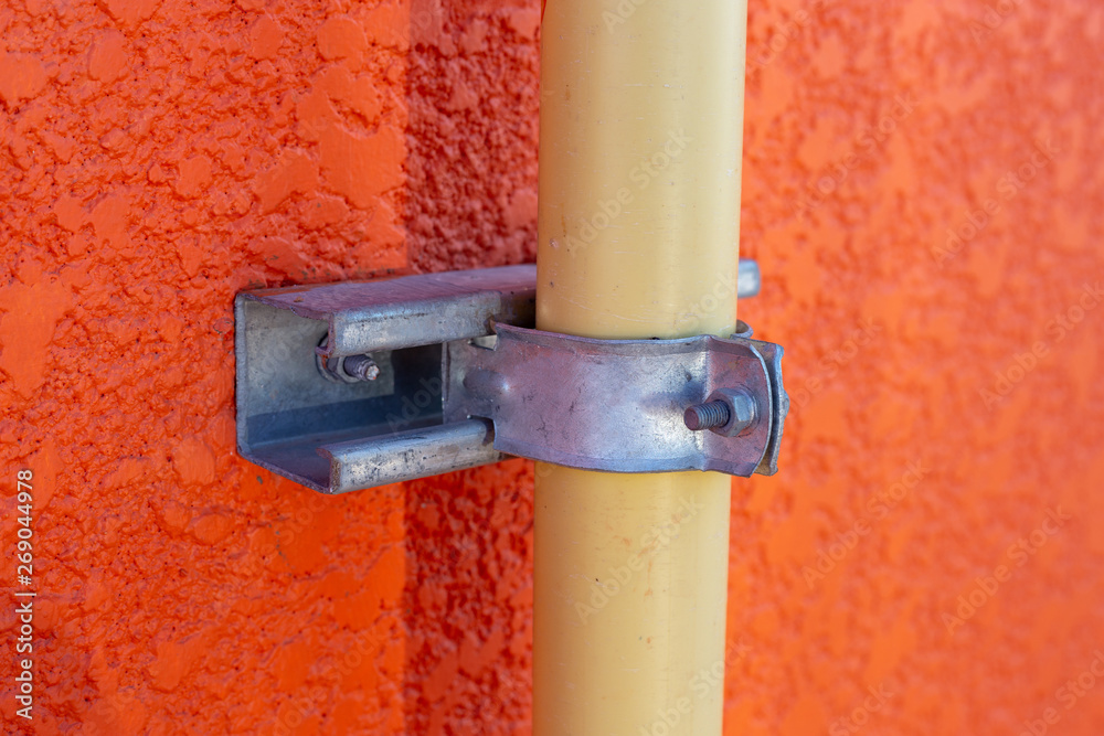 Conduit wall clamp discount