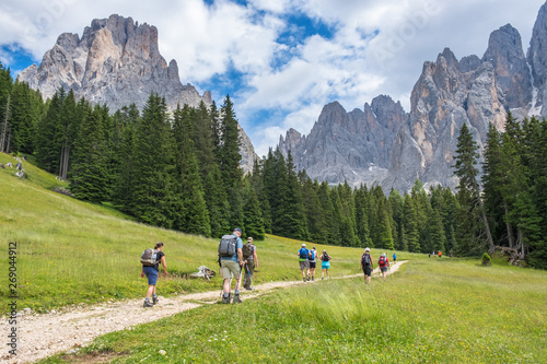 People hiking in the Dolomites Alps