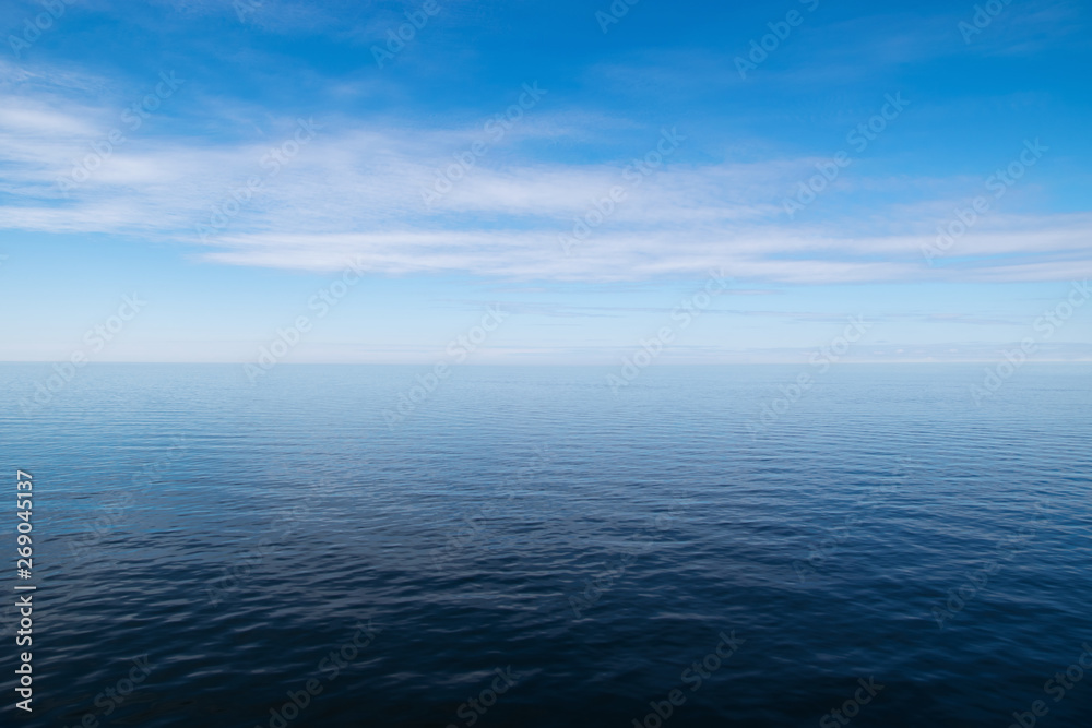 Vast blue sea, empty seascape and horizon over water.