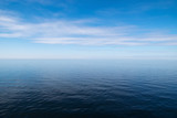 Vast blue sea, empty seascape and horizon over water.