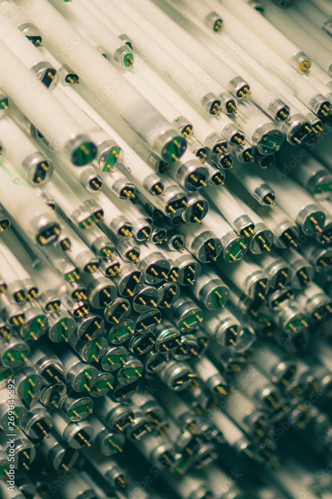 Concept of recycling. A pile of old neon tubes. Concept of recycling. A pile of old neon tubes.