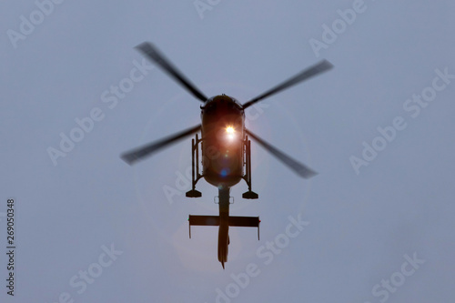 an helicopter from above with lights on