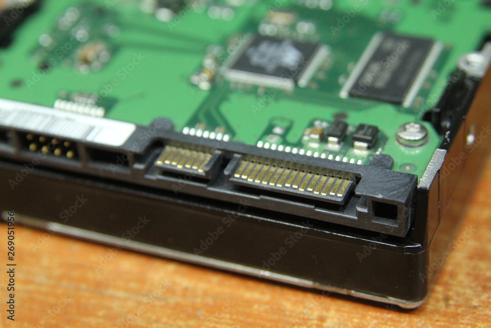 Computer harddisk close up SATA port Computer harddisk close up SATA port