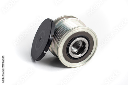 Freewheel alternator pulley on isolated white background with cap. Auto electrical parts.