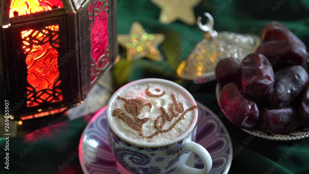 Eid - Islamic holiday. Coffee stencil. The Food of Ramadan. Cup of coffee, dates, dried fruits, sweets Eid - Islamic holiday. Coffee stencil. The Food of Ramadan. Cup of coffee, dates, dried fruits, sweets