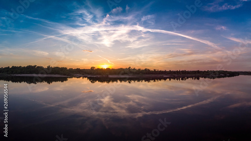 Beautiful landscape with reflection  blue sky and yellow sunlight in sunrise.